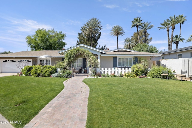 single story home with a garage and a front yard