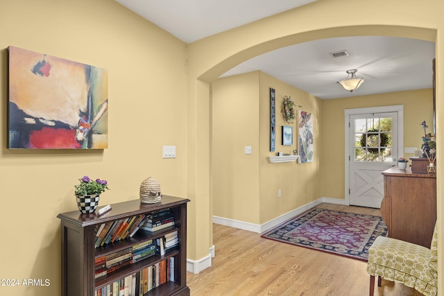 foyer entrance with hardwood / wood-style floors