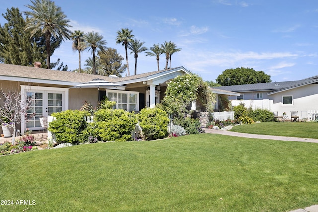 view of front of home featuring a front lawn