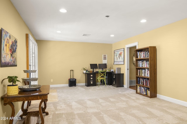 home office with carpet flooring