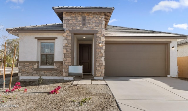 view of front of home with a garage