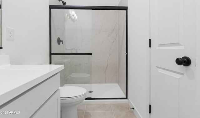 bathroom with walk in shower, vanity, and tile patterned flooring