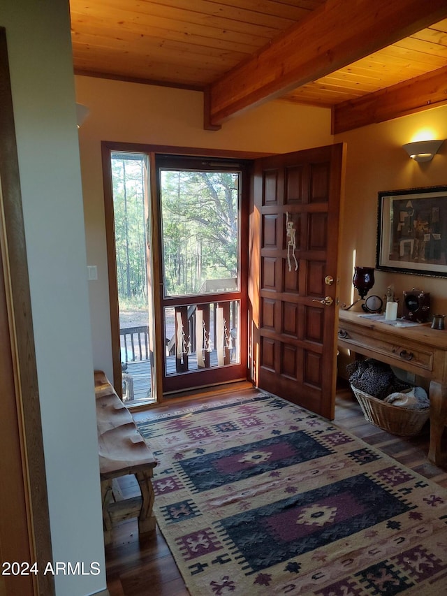 foyer entrance with beamed ceiling, wood ceiling, and hardwood / wood-style flooring