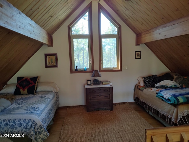 bedroom featuring lofted ceiling with beams, light hardwood / wood-style floors, and wooden ceiling