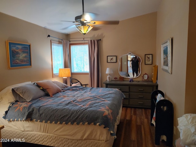 bedroom featuring dark wood-type flooring and ceiling fan