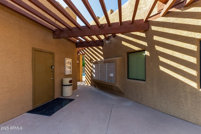 3434 E Baseline Rd Unit 126, Phoenix, AZ 85042 - doorway to property with a pergola and stucco siding