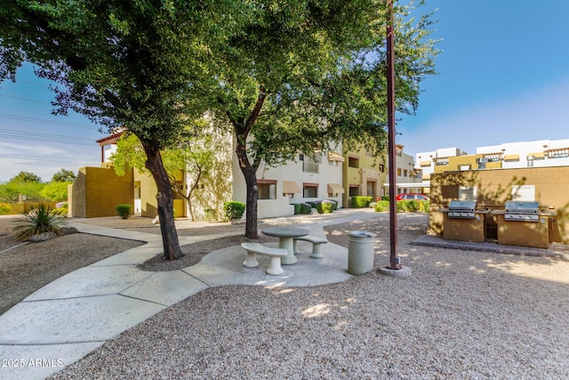 3434 E Baseline Rd Unit 126, Phoenix, AZ 85042 - view of home's community featuring area for grilling and a residential view