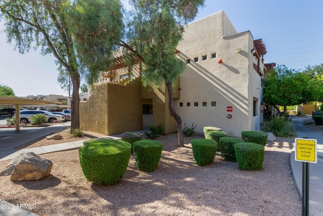 3434 E Baseline Rd Unit 126, Phoenix, AZ 85042 - view of property exterior with stucco siding