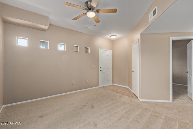 3434 E Baseline Rd Unit 126, Phoenix, AZ 85042 - empty room featuring light carpet and a ceiling fan