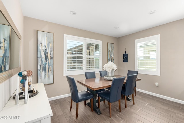 1297 W Chillingham Rd W, San Tan Valley, AZ 85143 - dining space with baseboards, light wood-type flooring, and recessed lighting