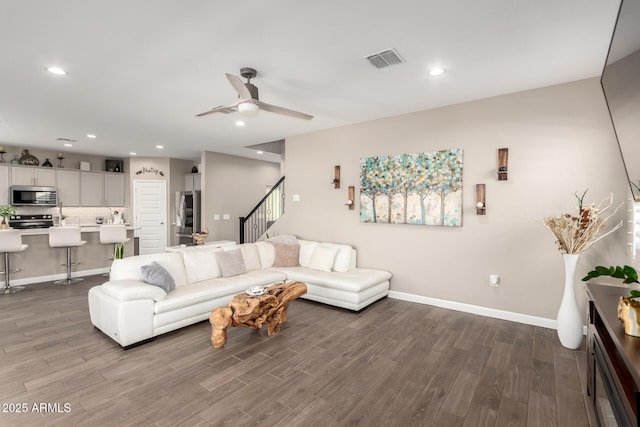 1297 W Chillingham Rd W, San Tan Valley, AZ 85143 - living room with stairway, wood finished floors, baseboards, a ceiling fan, and recessed lighting