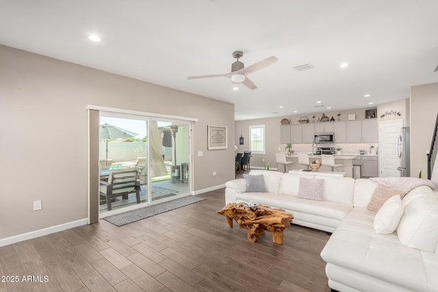 1297 W Chillingham Rd W, San Tan Valley, AZ 85143 - living area with a ceiling fan, baseboards, wood finished floors, and recessed lighting