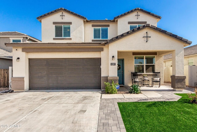 1297 W Chillingham Rd W, San Tan Valley, AZ 85143 - view of front facade featuring stucco siding, concrete driveway, and a garage
