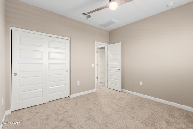 1297 W Chillingham Rd W, San Tan Valley, AZ 85143 - unfurnished bedroom with carpet flooring, a closet, baseboards, and a ceiling fan