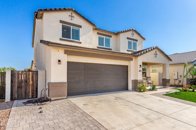 1297 W Chillingham Rd W, San Tan Valley, AZ 85143 - mediterranean / spanish house with stucco siding, an attached garage, a tile roof, and driveway