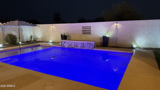 1297 W Chillingham Rd W, San Tan Valley, AZ 85143 - view of pool at twilight