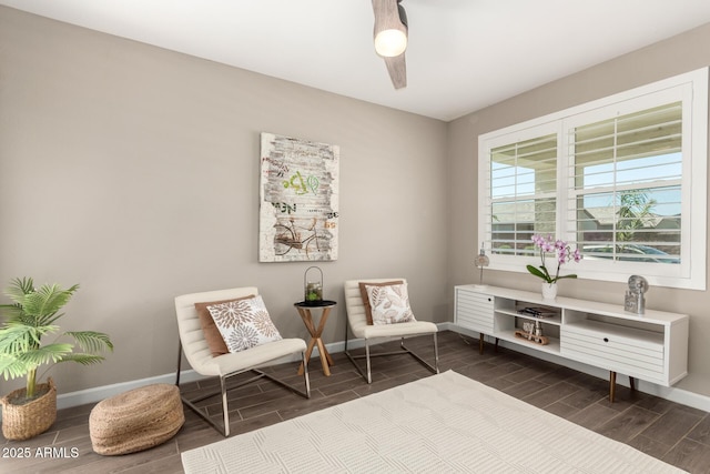 1297 W Chillingham Rd W, San Tan Valley, AZ 85143 - sitting room with wood tiled floors, baseboards, and ceiling fan