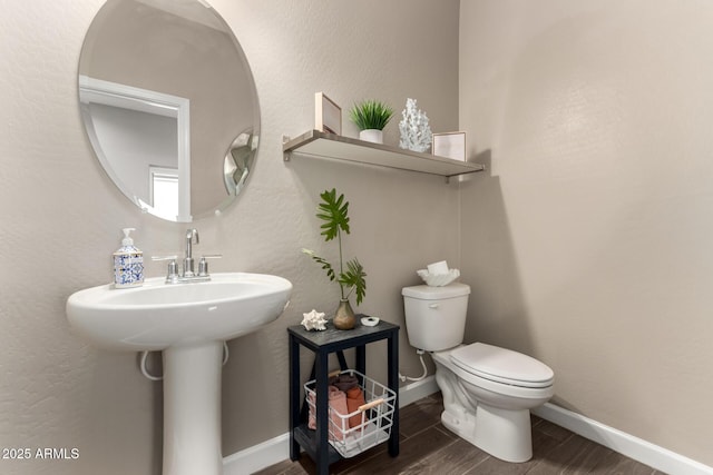 1297 W Chillingham Rd W, San Tan Valley, AZ 85143 - half bath with toilet, wood finished floors, and baseboards