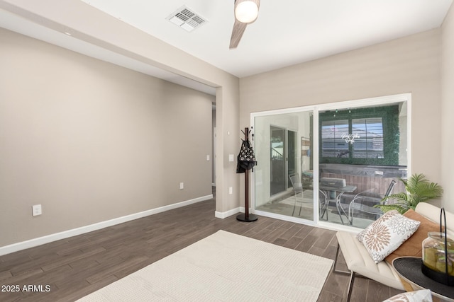 1297 W Chillingham Rd W, San Tan Valley, AZ 85143 - spare room with wood finished floors, baseboards, and ceiling fan