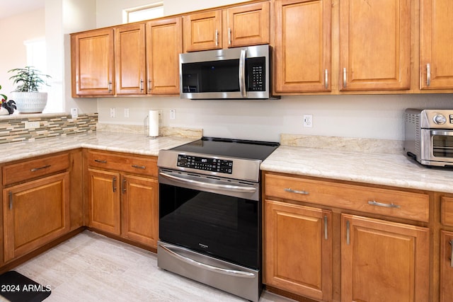 kitchen with appliances with stainless steel finishes