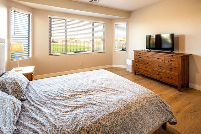 bedroom featuring light hardwood / wood-style floors