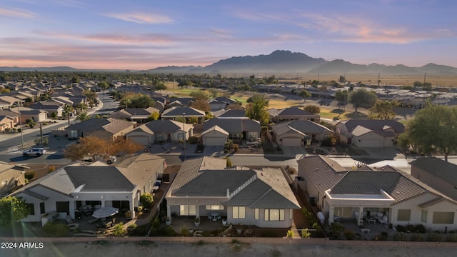 aerial view at dusk with a mountain view