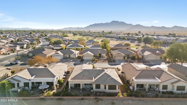 birds eye view of property featuring a mountain view