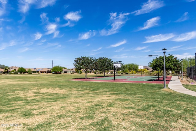 18076 W Redwood Ln, Goodyear, AZ 85338 - view of basketball court featuring a lawn and community basketball court