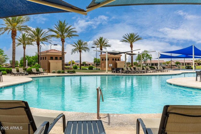 18076 W Redwood Ln, Goodyear, AZ 85338 - community pool with a patio area