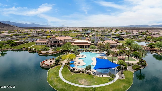 18076 W Redwood Ln, Goodyear, AZ 85338 - aerial view of residential area featuring a water and mountain view and a pool