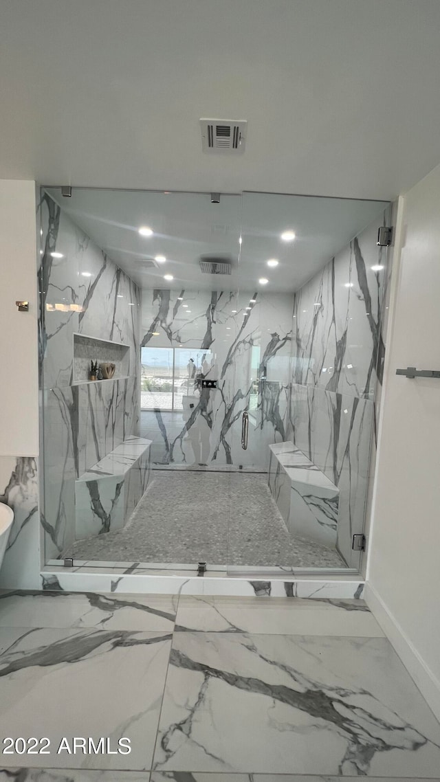 bathroom featuring walk in shower