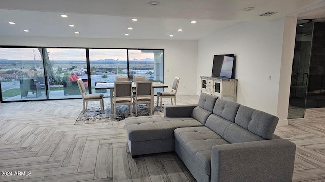 living room featuring light parquet floors