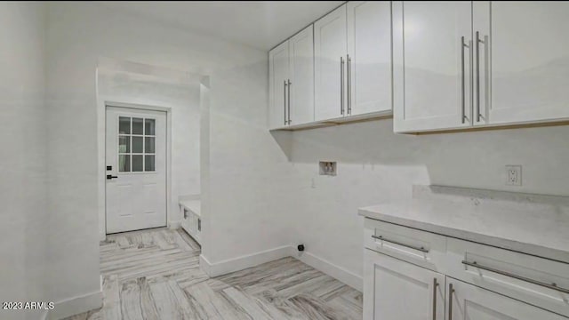 laundry area featuring cabinets and washer hookup