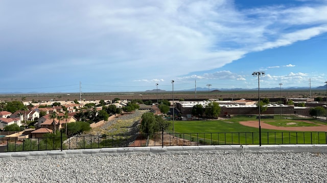 view of home's community with a lawn