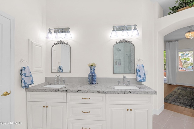 13914 E Laurel Ln, Scottsdale, AZ 85259 - full bathroom with baseboards, tile patterned floors, a sink, and double vanity