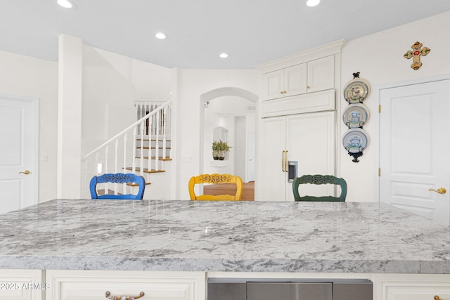 13914 E Laurel Ln, Scottsdale, AZ 85259 - interior space with arched walkways, recessed lighting, and stairway