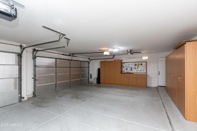 garage featuring a garage door opener and a ceiling fan
