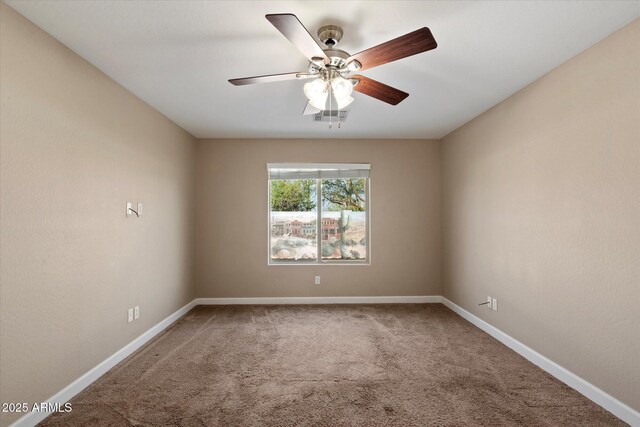 2487 S Conestoga Rd, Apache Junction, AZ 85119 - carpeted spare room with a ceiling fan and baseboards