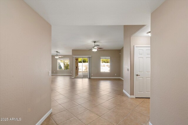 2487 S Conestoga Rd, Apache Junction, AZ 85119 - spare room with ceiling fan and light tile patterned floors