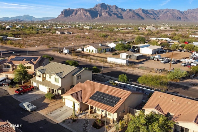 2487 S Conestoga Rd, Apache Junction, AZ 85119 - aerial perspective of suburban area with a mountainous background