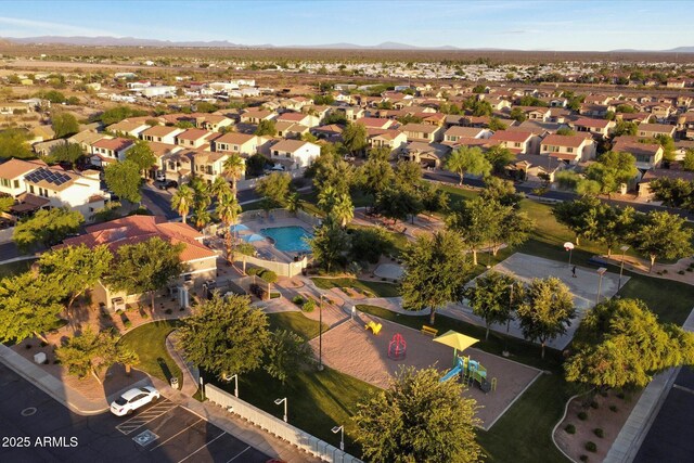 2487 S Conestoga Rd, Apache Junction, AZ 85119 - aerial overview of property's location with nearby suburban area and a mountain backdrop
