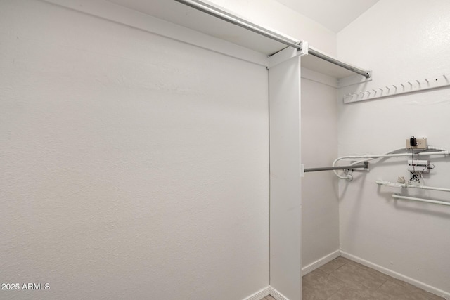 19601 N 7th St Unit 1022, Phoenix, AZ 85024 - walk in closet featuring light tile patterned flooring