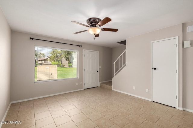 19601 N 7th St Unit 1022, Phoenix, AZ 85024 - spare room featuring a ceiling fan, stairway, and light tile patterned floors