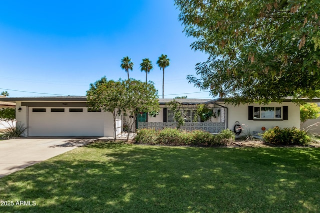 1423 E 1st St, Mesa, AZ 85203 - ranch-style house with an attached garage, a front yard, and driveway