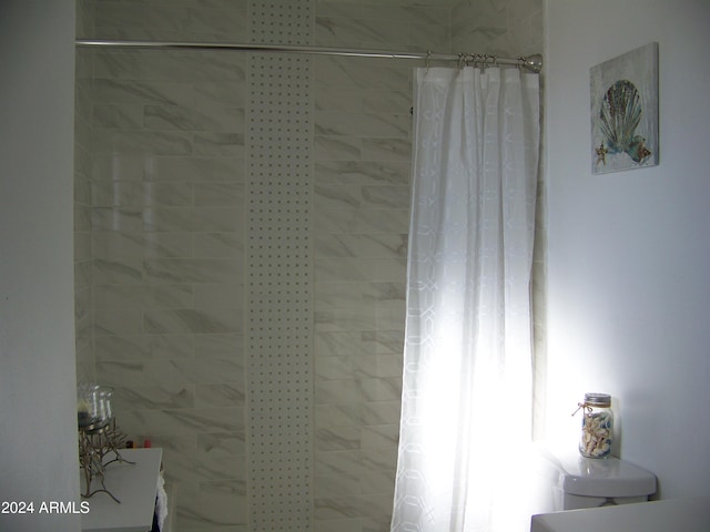 interior details featuring walk in shower