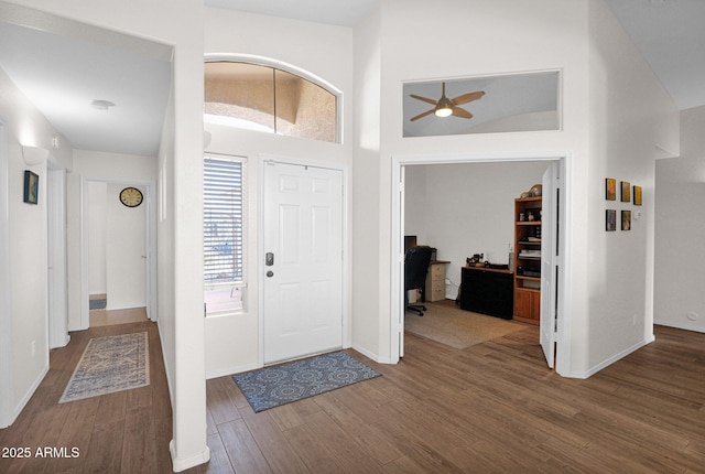 4611 E Night Glow Dr, Cave Creek, AZ 85331 - entryway featuring wood finished floors, ceiling fan, a high ceiling, and baseboards