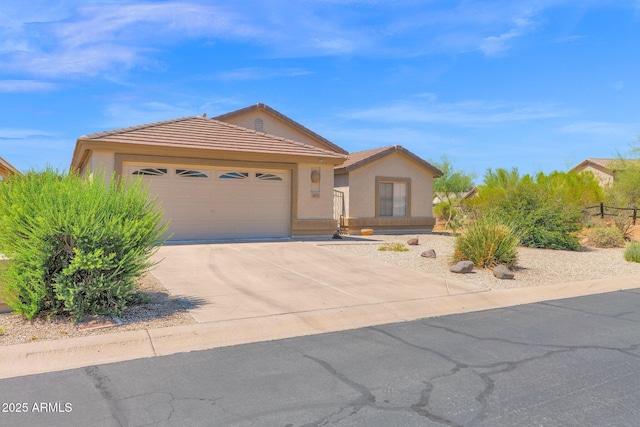 4611 E Night Glow Dr, Cave Creek, AZ 85331 - ranch-style house with a garage, concrete driveway, stucco siding, and a tiled roof