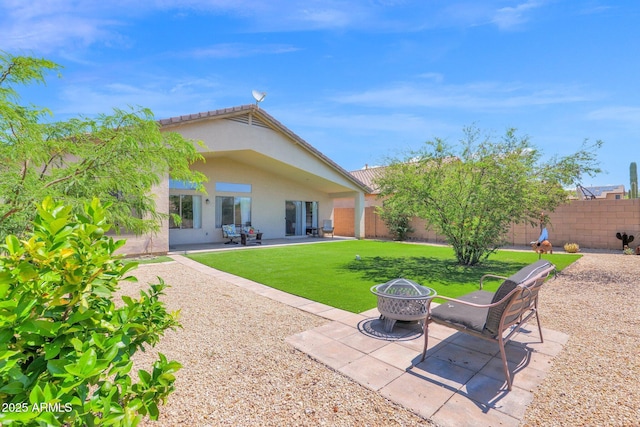4611 E Night Glow Dr, Cave Creek, AZ 85331 - back of house featuring a fire pit, a patio, and stucco siding