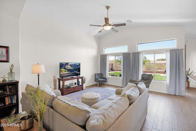 4611 E Night Glow Dr, Cave Creek, AZ 85331 - living room with a ceiling fan, light wood-style flooring, and high vaulted ceiling