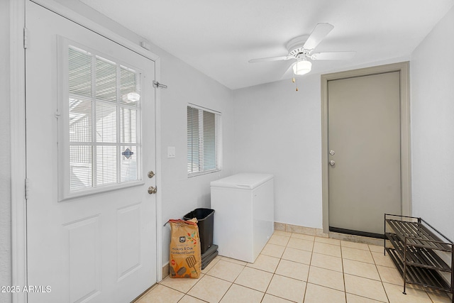1511 W Mesquite St, Chandler, AZ 85224 - laundry room featuring plenty of natural light, a ceiling fan, baseboards, and light tile patterned flooring